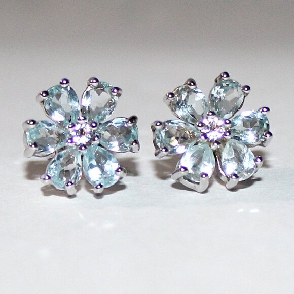 Sterling Silver Blue Topaz Floral Stud Earrings - Picture 1 of 4